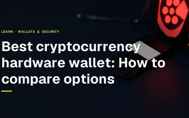 The guide title over a dark desk with a hardware wallet, steel plate, padlock and shield lit in red.