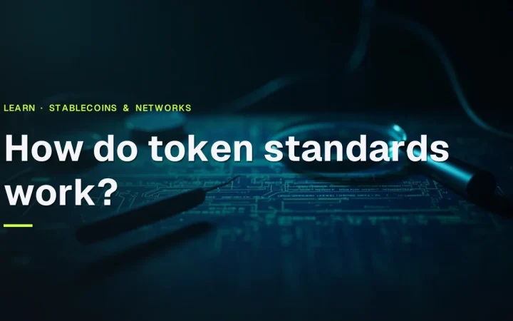 How do token standards work? in teal text over a dark navy background with glowing circuits, glass tokens, and a magnifying glass.