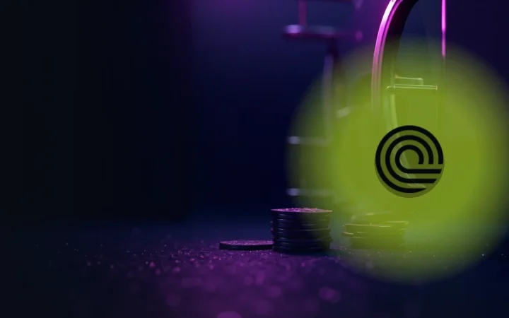The Ondo logo over a dark navy background of blank coins and a glass vault.