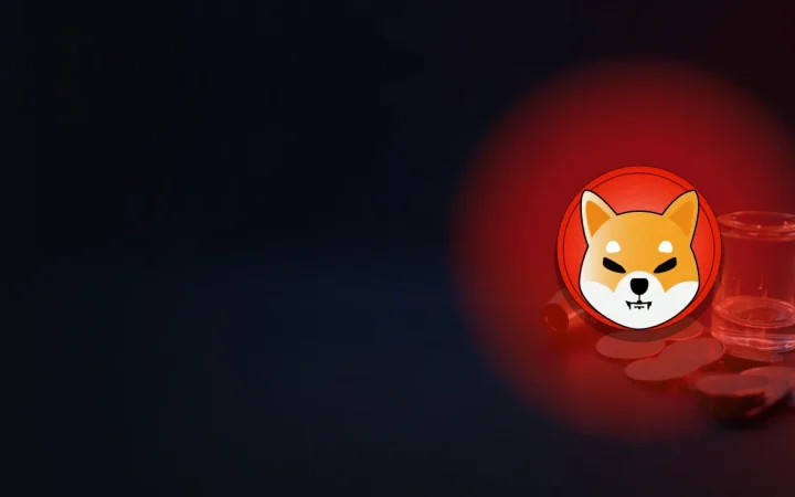 The Shiba Inu logo over a dark background of blank tokens and a glass cylinder.
