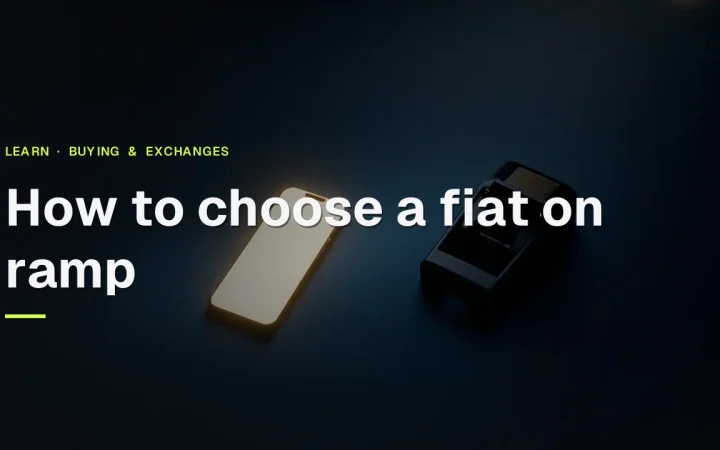 How to choose a fiat on ramp title over a dark navy desk with a glowing phone, payment terminal and paper slips.