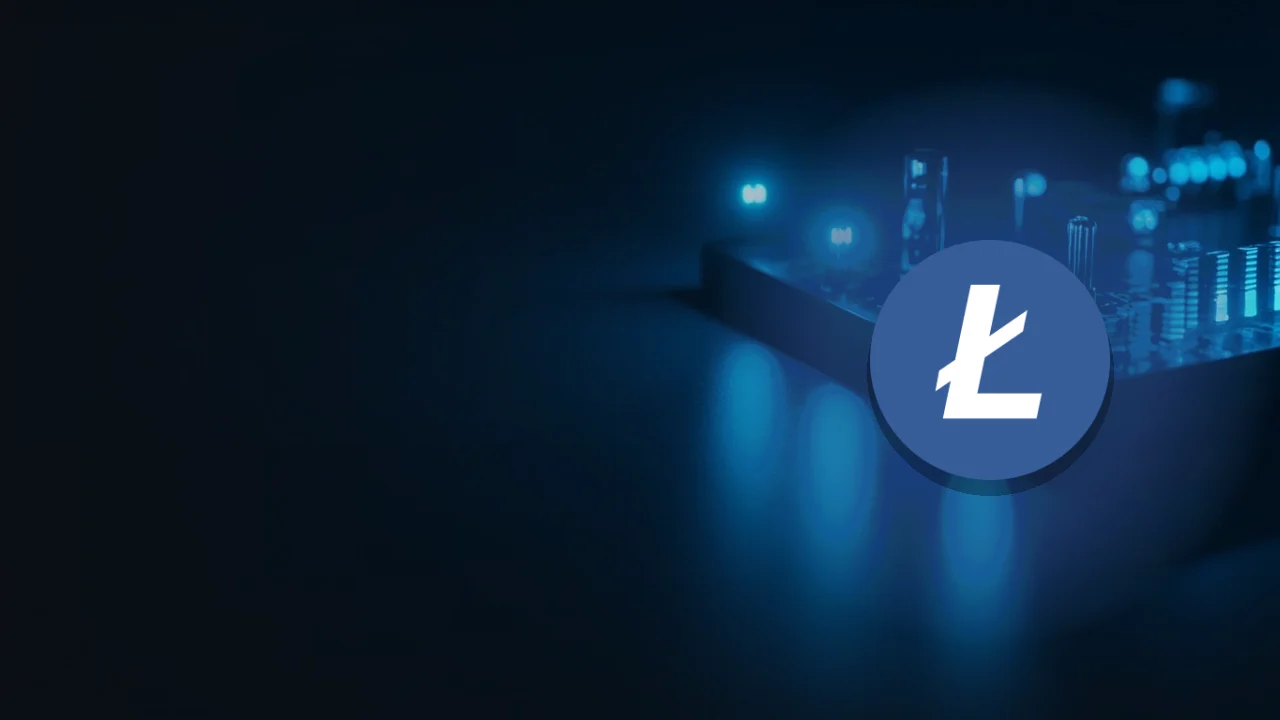 Litecoin-logoet over et mørkeblåt skrivebord med glødende blå bjælker og indikatorlys.