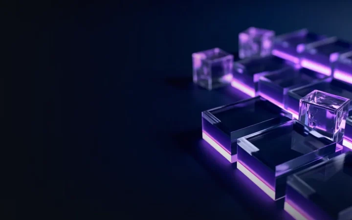 A dark navy background with glowing glass blocks joined by violet light.