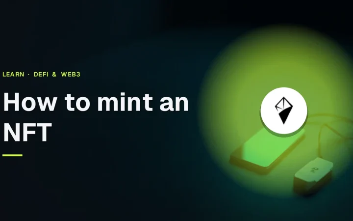 Forside til guiden How to mint an NFT med AINFT-logoet og et mørkt skrivebord med en telefon, drev og kabel.