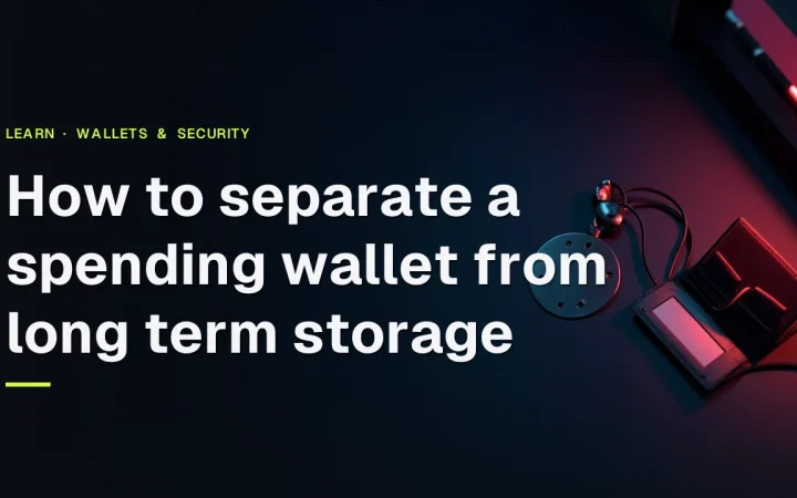 A dark navy desk with a blank-screen hardware wallet, a steel plate, a padlock and a shield lit by red accents, the left side empty.