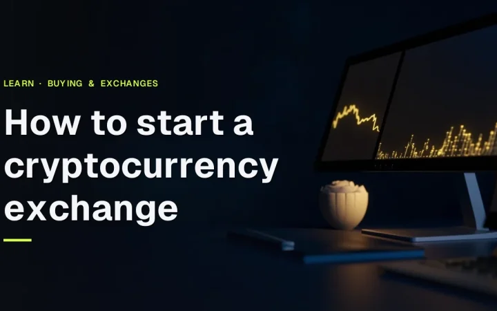 The title How to start a cryptocurrency exchange over a dark desk with glowing gold monitors, a blank calculator and a pen.