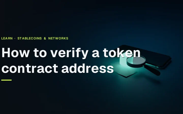 The title How to verify a token contract address with a dark navy background of a phone, glowing cube and magnifying glass.
