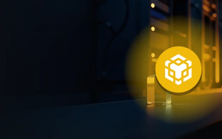 The BNB logo over dark server racks and a glass block.