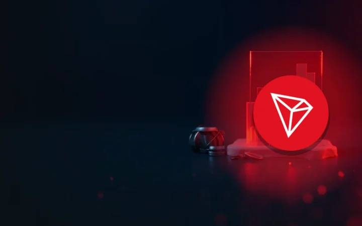 The TRON logo over a dark navy background of a glass block and glowing bars.