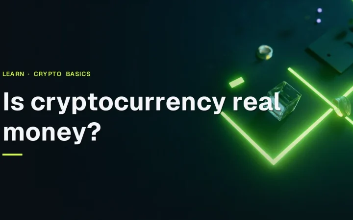 The title Is cryptocurrency real money appears over a dark navy scene with a glass block, steel plate and lime green light trails.