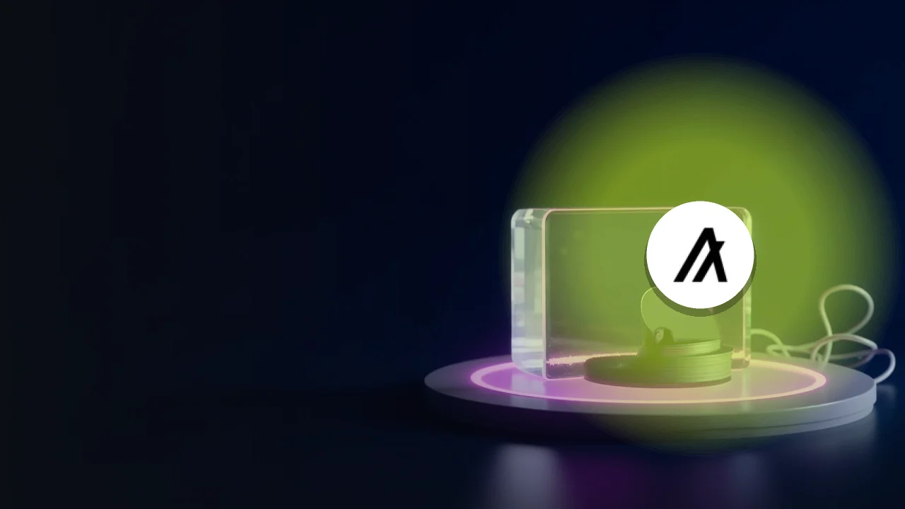 The Algorand logo over a dark navy scene of a glass block, blank discs and a small screen lit in violet.