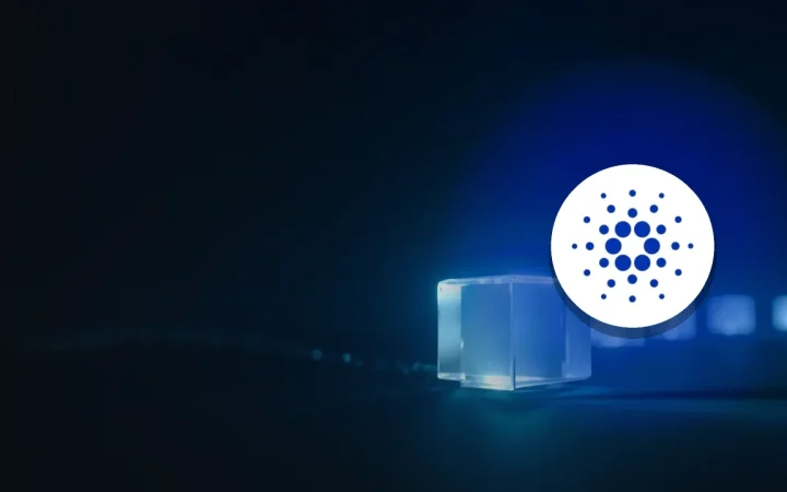 The Cardano logo over a dark navy background and a glowing blue glass block on the right.