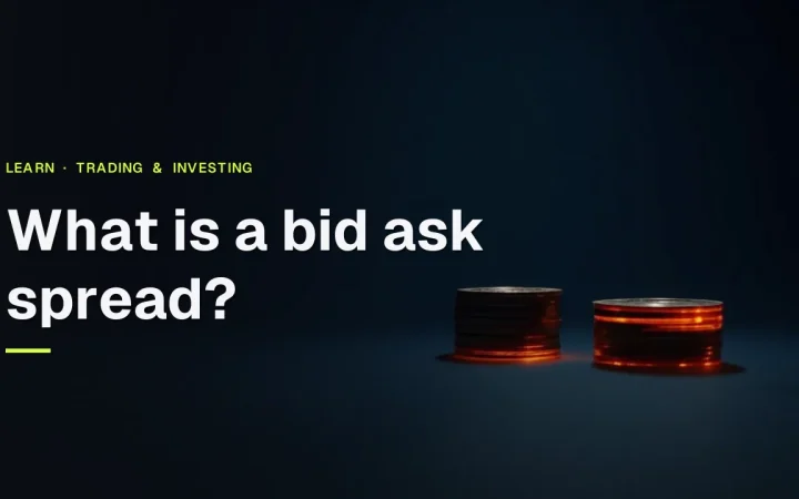 The title What is a bid ask spread over a dark navy desk with two stacks of blank coins separated by a glowing gap