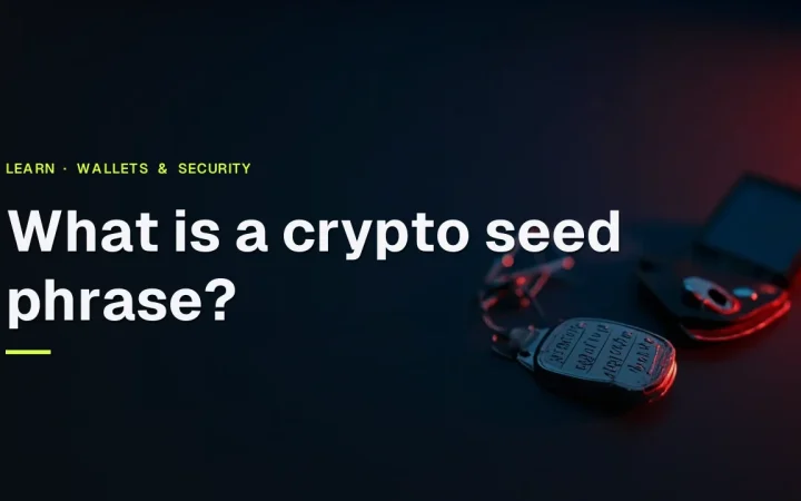 The title What is a crypto seed phrase over a dark desk with a steel backup plate, a padlock and a hardware wallet with a blank screen.