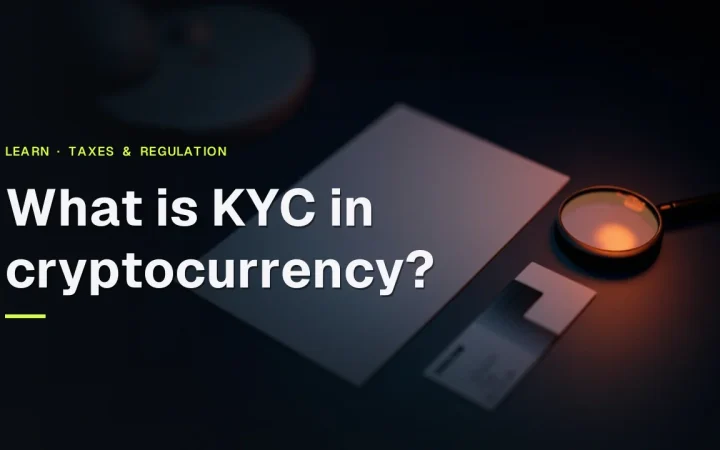 What is KYC in cryptocurrency title over a dark navy desk with a blank ID card, blank form and magnifying glass in warm orange light.