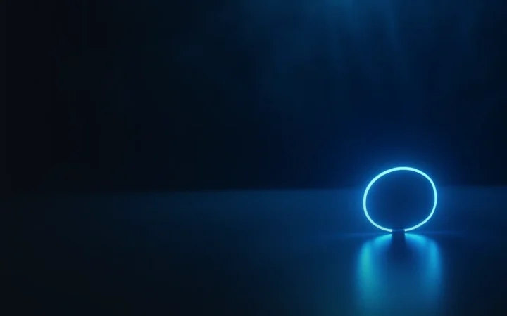 A glowing blue coin stack on a dark navy background.
