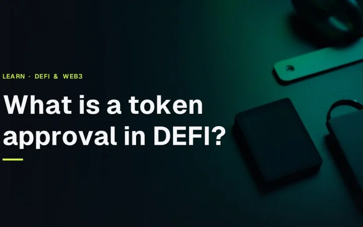 The title What is a token approval in DEFI? over a dark desk with a hardware wallet, steel plate and padlock lit in green.