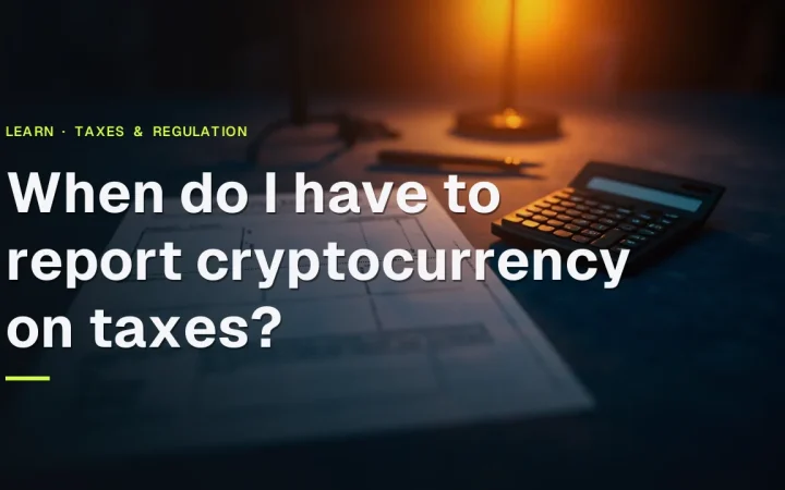 The title When do I have to report cryptocurrency on taxes? over a dark desk with blank forms, a calculator and a pen.